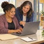 Parent attends job training while a child plays with a caregiver nearby.